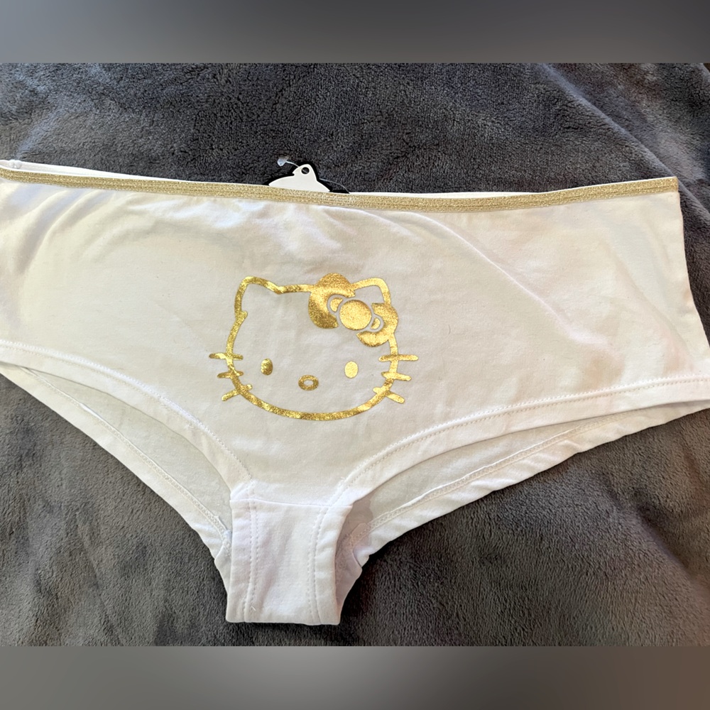 Hello Kitty ! White and gold hipster bottoms .